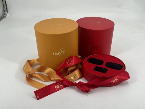 OEM e ODM Round Gift Box with Silk Ribbon Cosmetic Products Boxes with Gold Stamping and EVA liner para venda